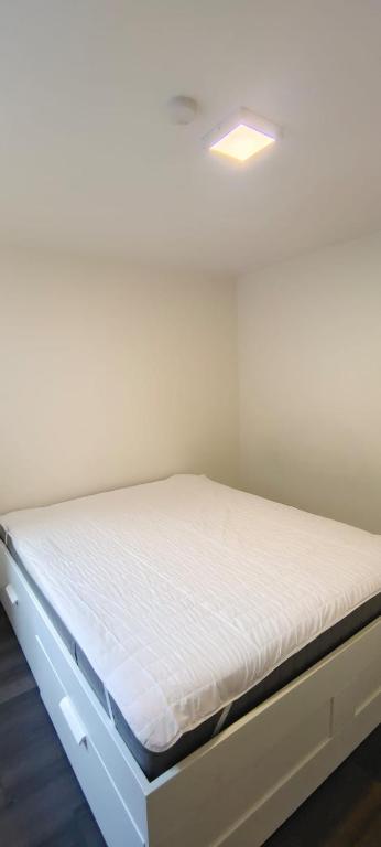 Postel nebo postele na pokoji v ubytování Lagunen Apartments