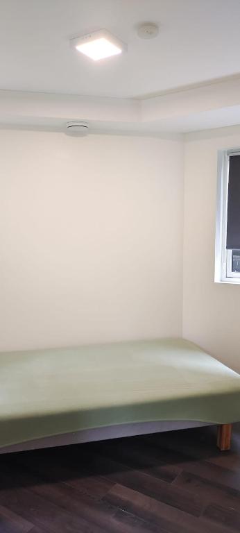 Postel nebo postele na pokoji v ubytování Lagunen Apartments