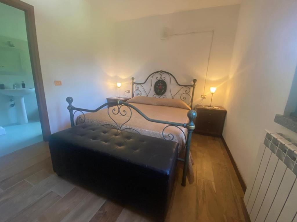 Postel nebo postele na pokoji v ubytování B&B Monteguzzo