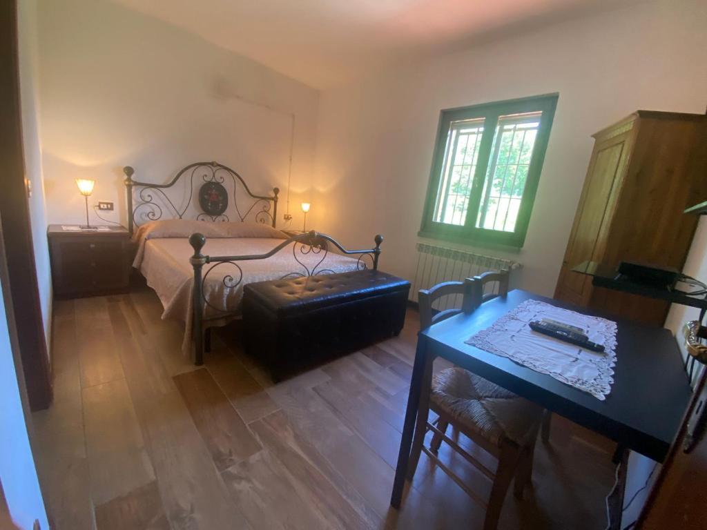 Postel nebo postele na pokoji v ubytování B&B Monteguzzo