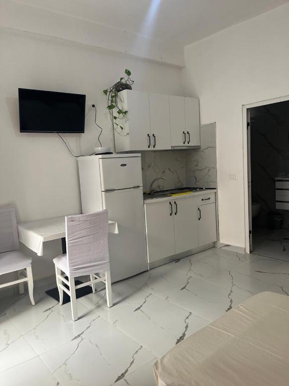 Kuchyň nebo kuchyňský kout v ubytování ELIO's Room