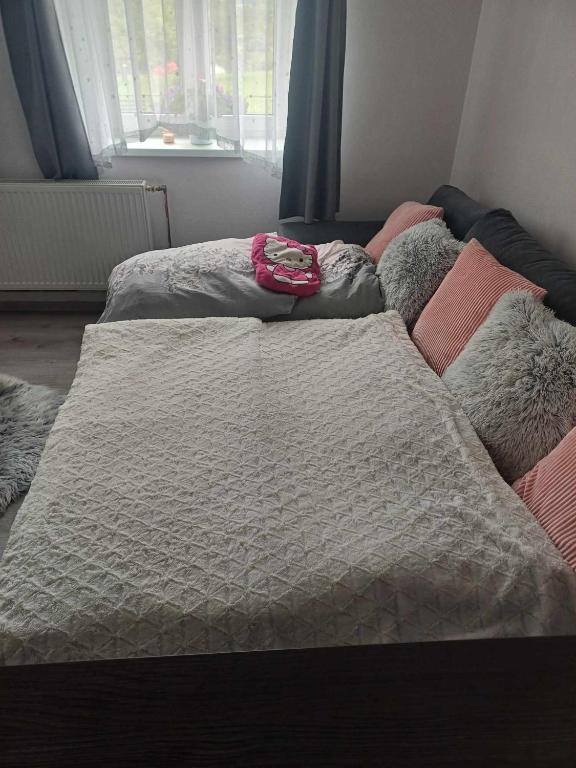 Postel nebo postele na pokoji v ubytování Ubytování Dobešov