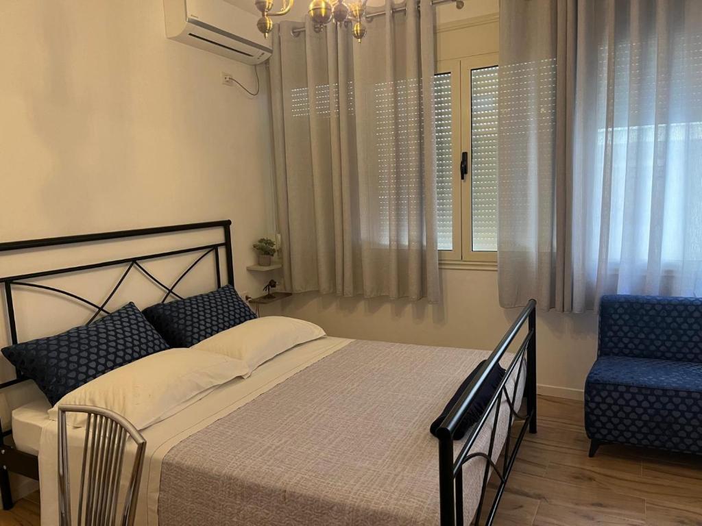Postel nebo postele na pokoji v ubytování A&A Rooms