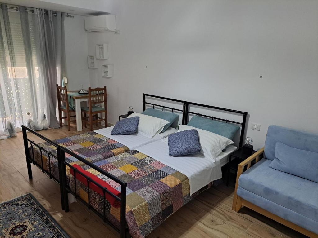 Postel nebo postele na pokoji v ubytování A&A Rooms