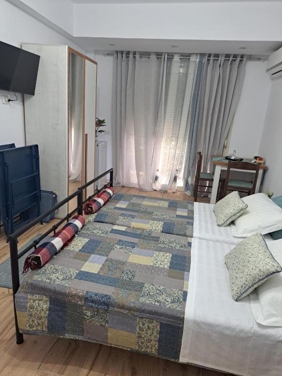 Postel nebo postele na pokoji v ubytování A&A Rooms