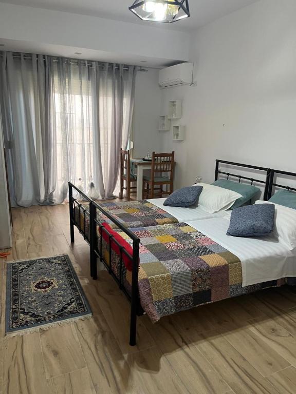Postel nebo postele na pokoji v ubytování A&A Rooms