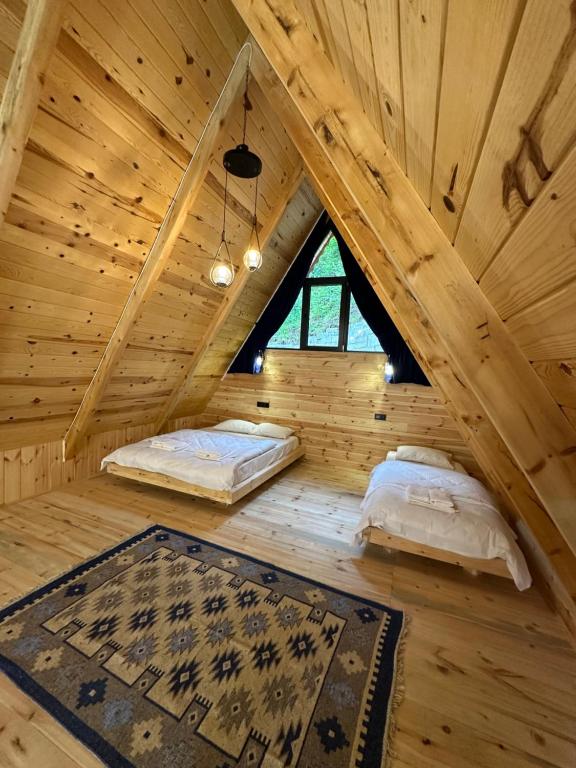 Postel nebo postele na pokoji v ubytování Walnut Bungalow