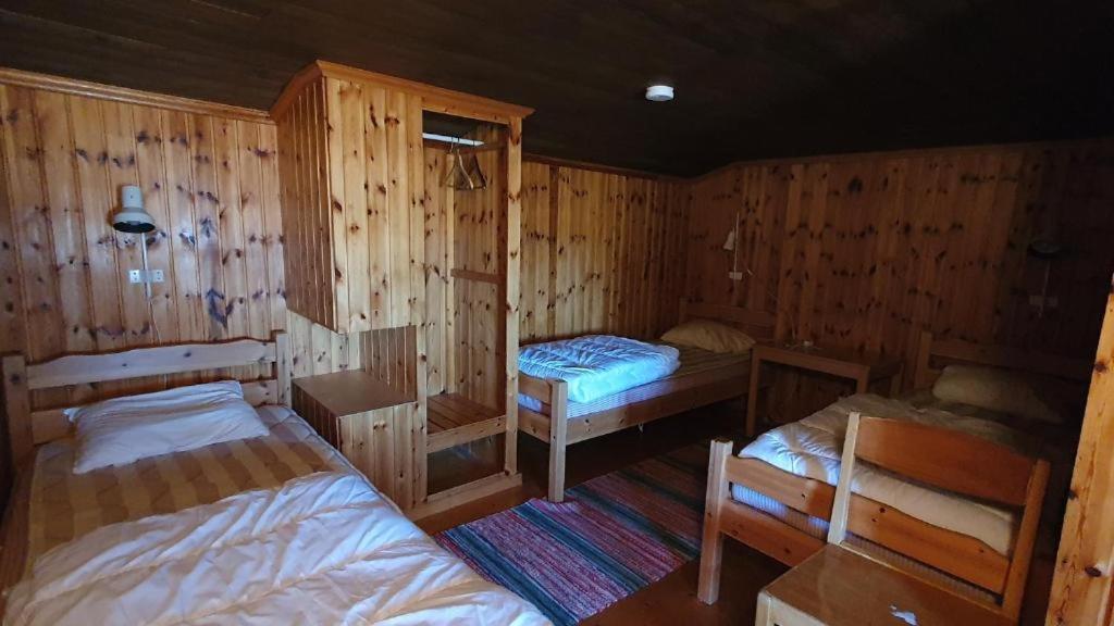 Postel nebo postele na pokoji v ubytování Vandrarhemmet Gammelgården