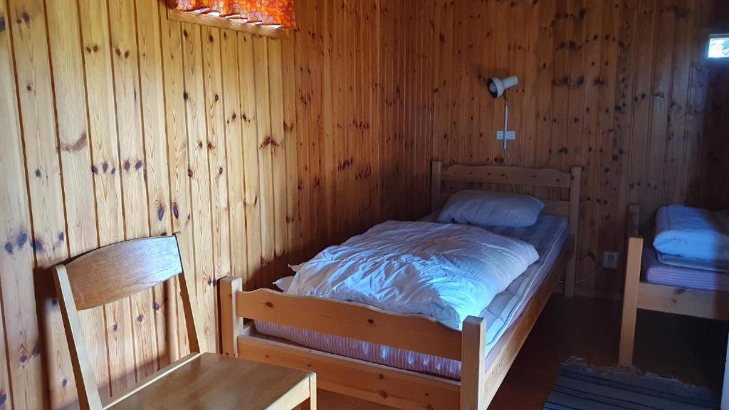 Postel nebo postele na pokoji v ubytování Vandrarhemmet Gammelgården