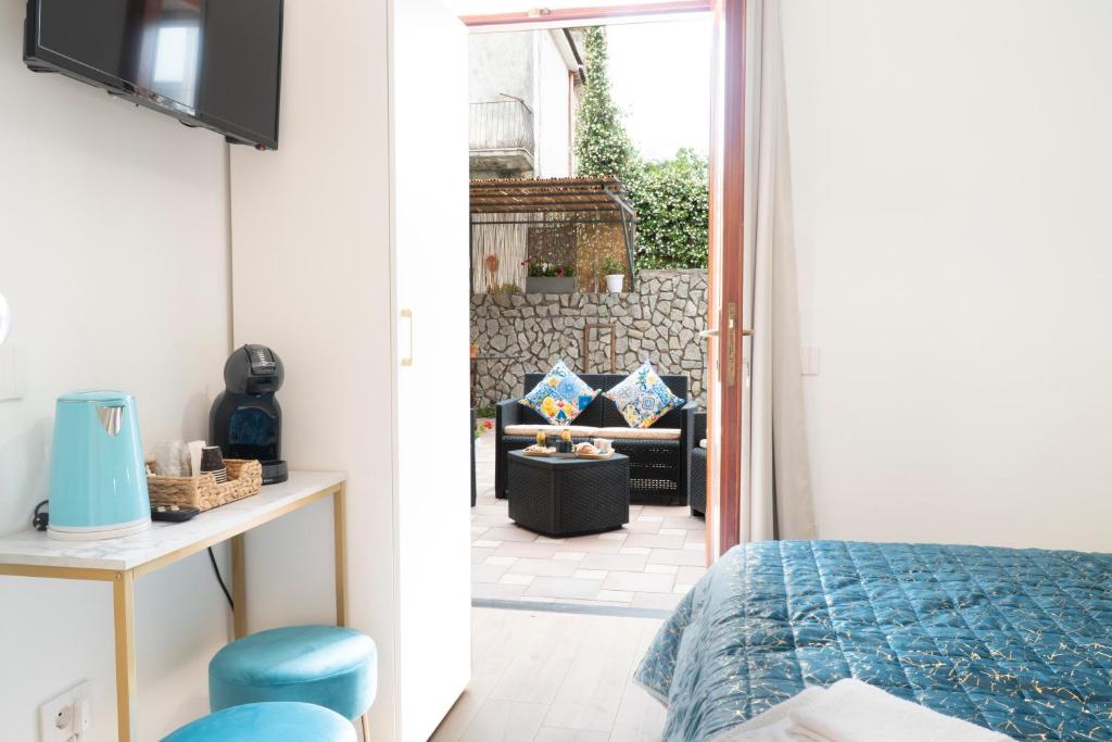 Postel nebo postele na pokoji v ubytování B&B La Piana