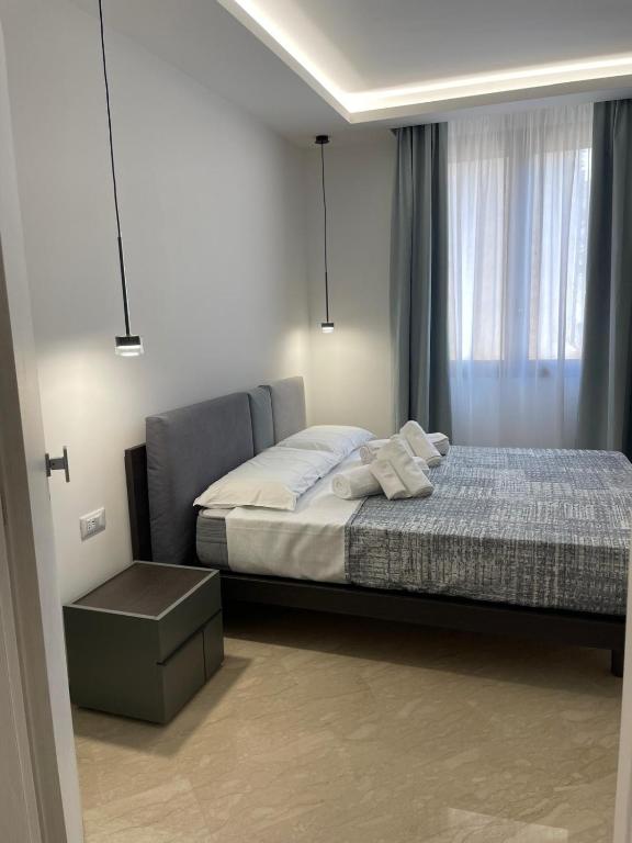 Postel nebo postele na pokoji v ubytování Olea