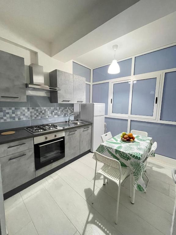 Kuchyň nebo kuchyňský kout v ubytování Leverblu House