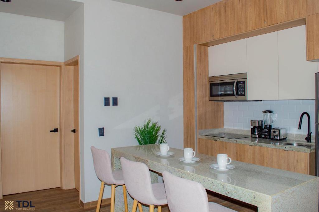 Η κουζίνα ή μικρή κουζίνα στο Hermoso y nuevo depto a pie de playa