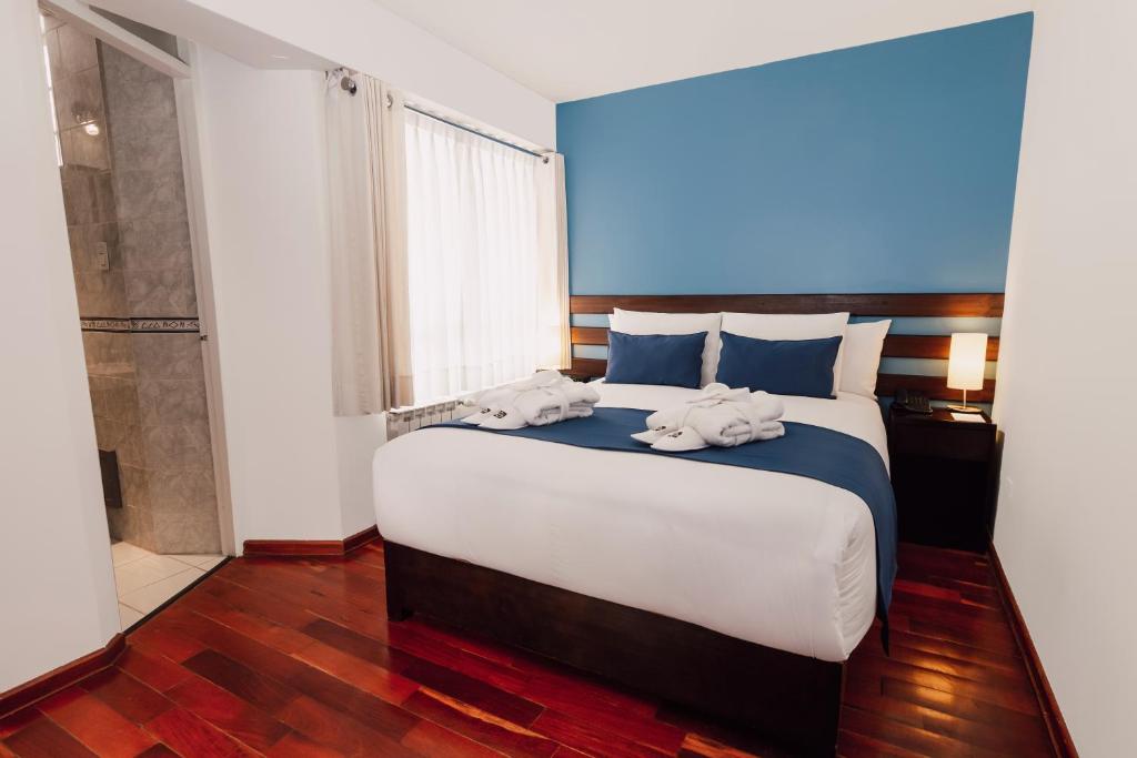 Voodi või voodid majutusasutuse Wayqey Hotel toas