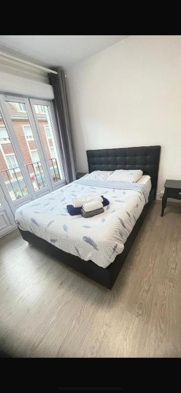 Postel nebo postele na pokoji v ubytování Chambre double