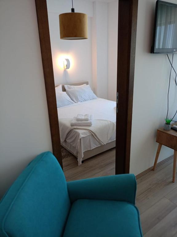 Postel nebo postele na pokoji v ubytování Jagodina Apartman Nastasija- gleda na Aqva park