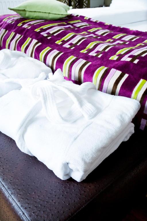 Postel nebo postele na pokoji v ubytování Quality Hotel Augustin