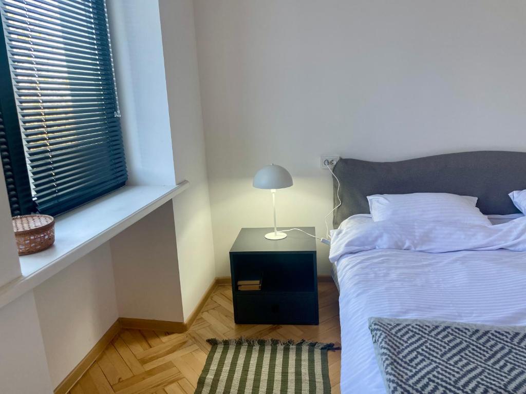 Postel nebo postele na pokoji v ubytování Twins Guest House