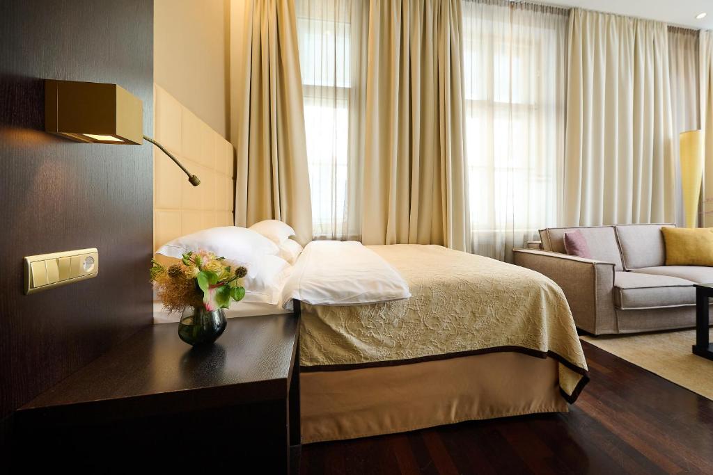 Łóżko lub łóżka w pokoju w obiekcie MyPlace Premium Apartments