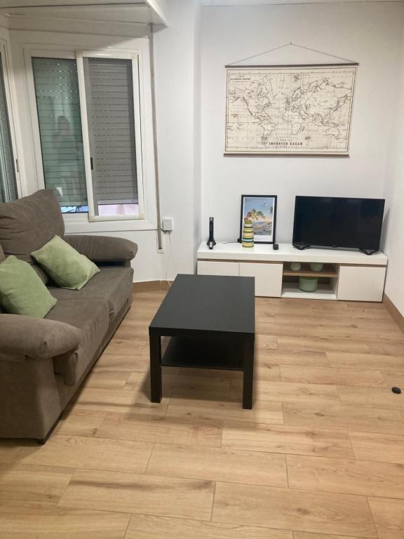TV a/nebo společenská místnost v ubytování LA PEPITA