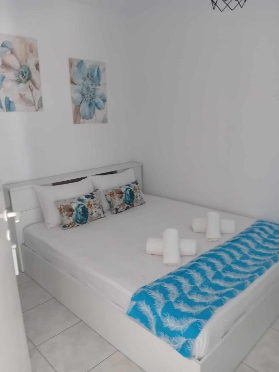 Postel nebo postele na pokoji v ubytování Villa De Flores