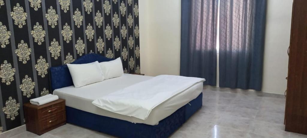 Ένα ή περισσότερα κρεβάτια σε δωμάτιο στο BABYLOON بابيلون