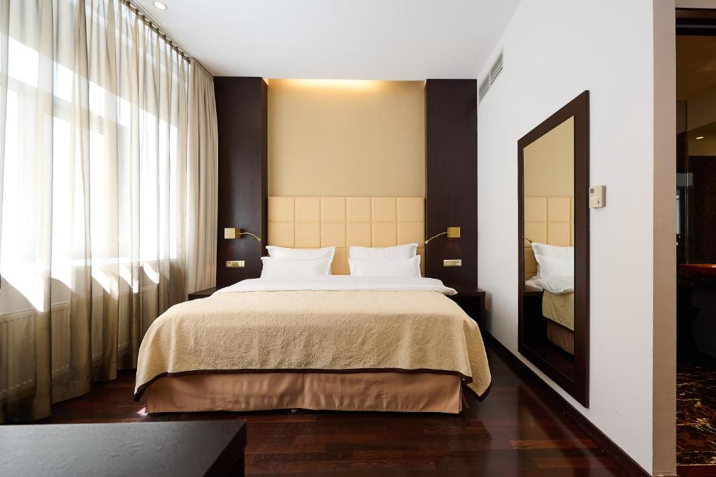 Łóżko lub łóżka w pokoju w obiekcie MyPlace Premium Apartments