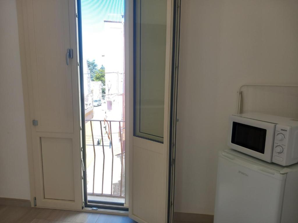 Kuchyň nebo kuchyňský kout v ubytování TORRE SUL MARE affittacamere Ugento