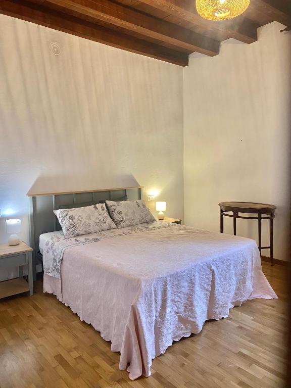 Postel nebo postele na pokoji v ubytování Nel Cuore di Volta Mantovana