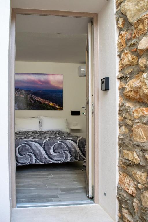 Postel nebo postele na pokoji v ubytování S' APPosenteddu