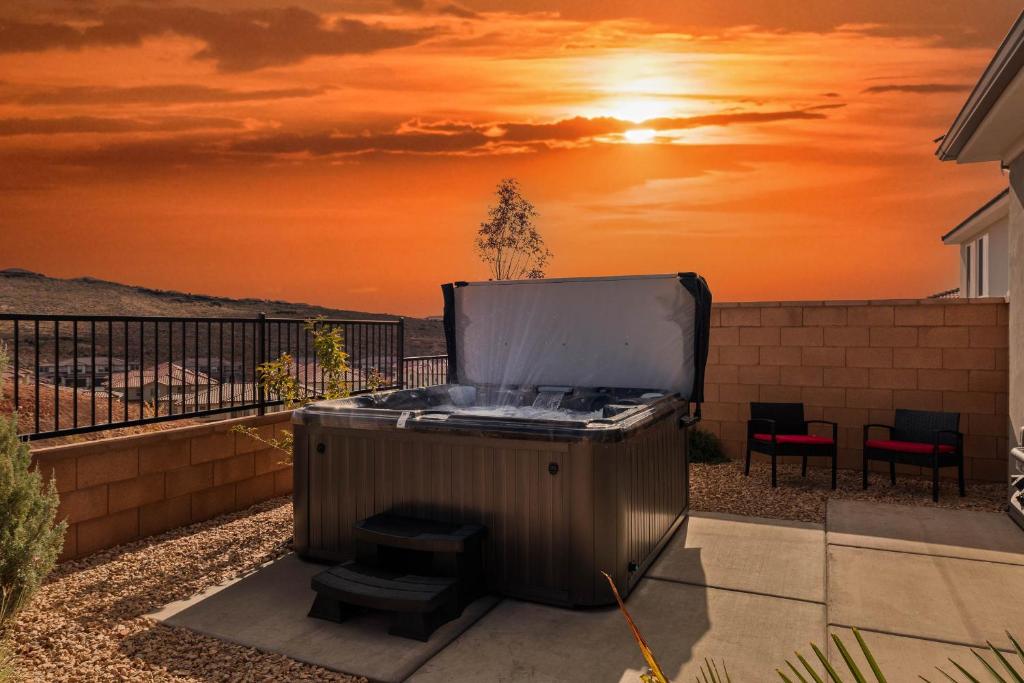 a hot tub on a patio with a sunset at Angels Landing3bed2ba Private Hot Tub in Washington