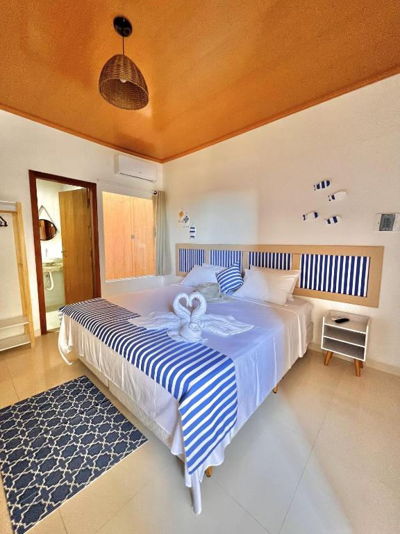 Postel nebo postele na pokoji v ubytování Casarao da Terra