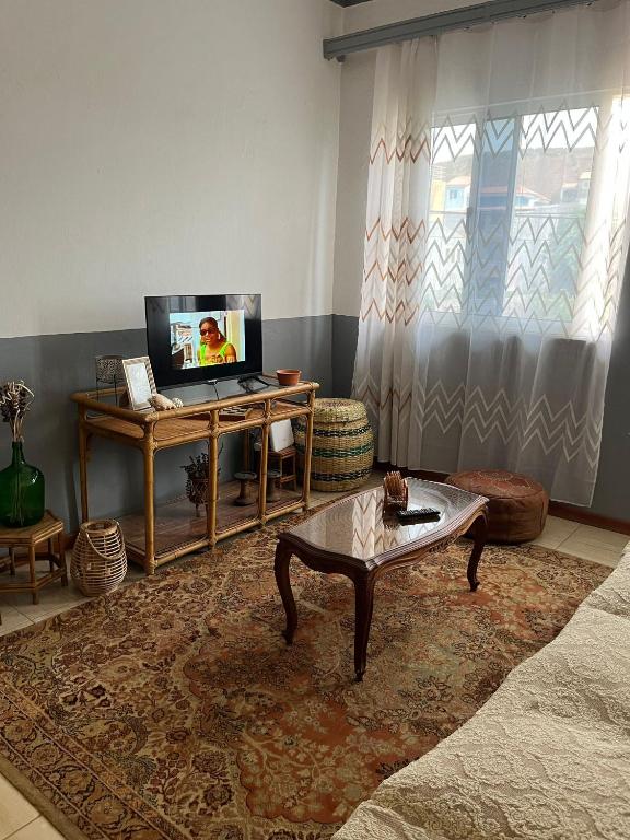 TV a/nebo společenská místnost v ubytování Casa Tota