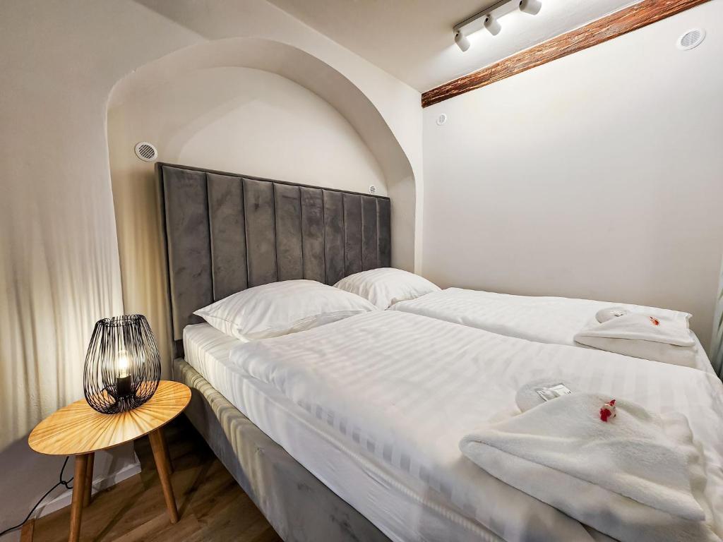 Postel nebo postele na pokoji v ubytování Apartmány Rangifer