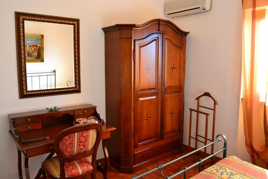 Postel nebo postele na pokoji v ubytování Hotel Canusium