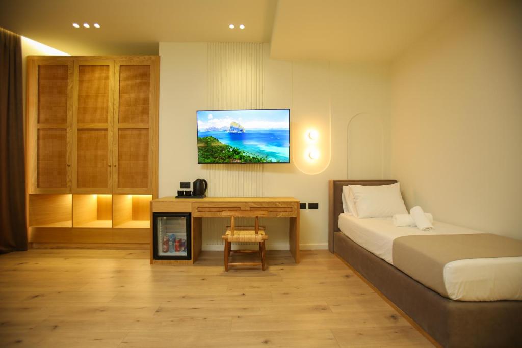 TV a/nebo společenská místnost v ubytování Hotel Brooklyn Vlore