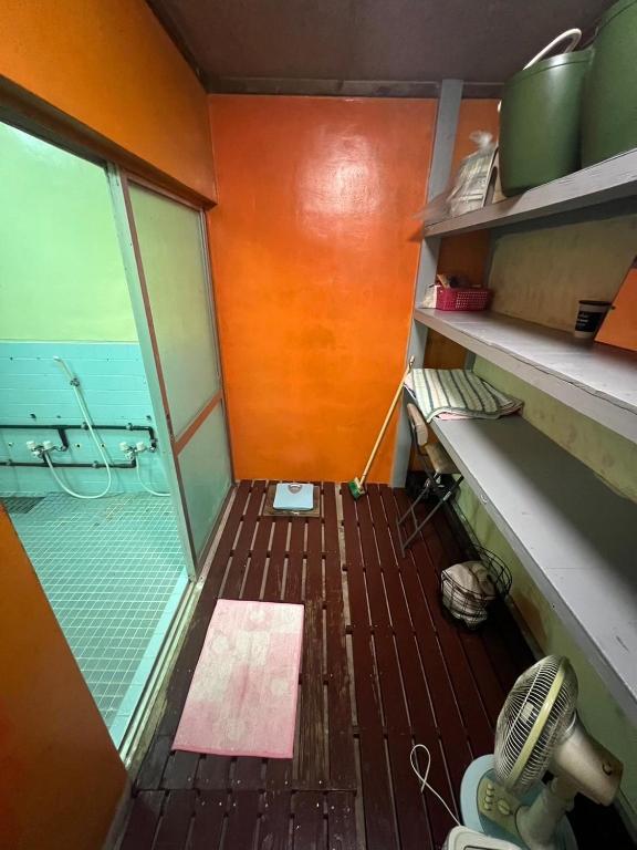an inside view of a room with a window at やどバンブー in Hateruma