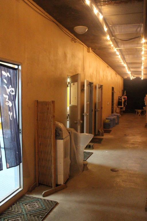 an empty hallway of a building with a room at やどバンブー in Hateruma