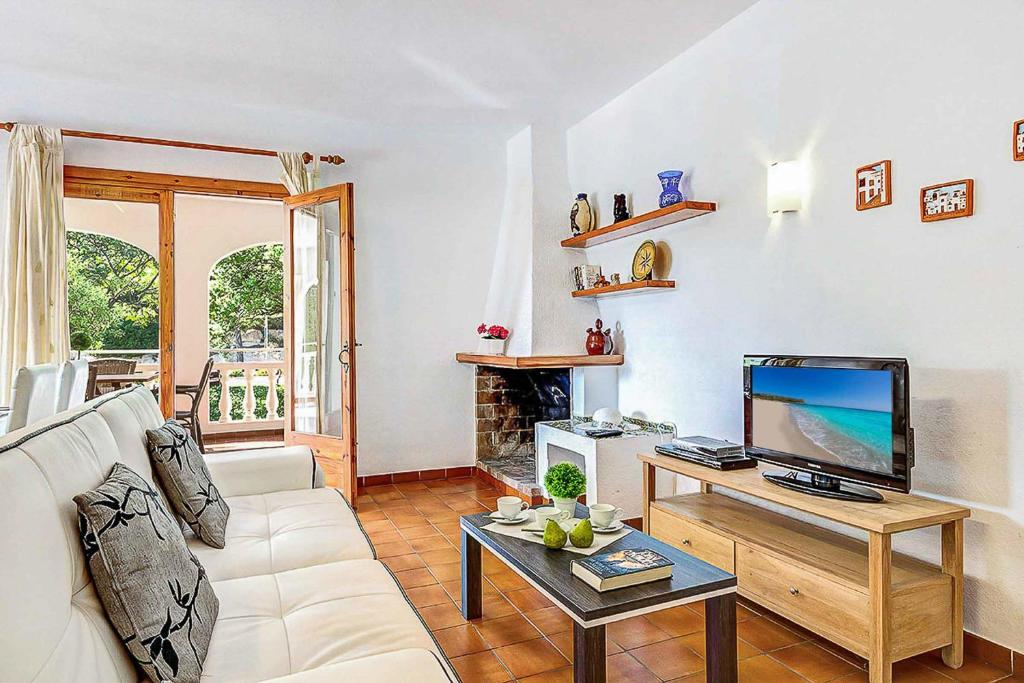 TV a/nebo společenská místnost v ubytování Villa Truvi