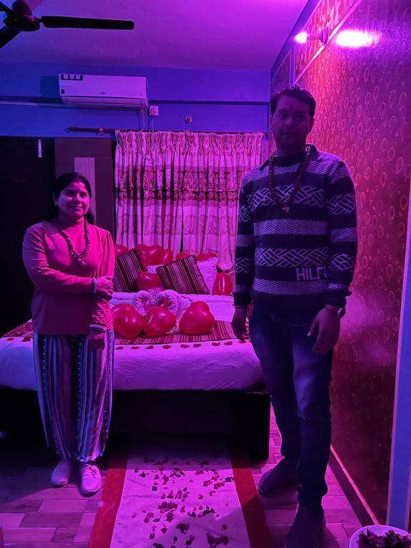 Rúm í herbergi á Hotel Middle Point Pvt Ltd