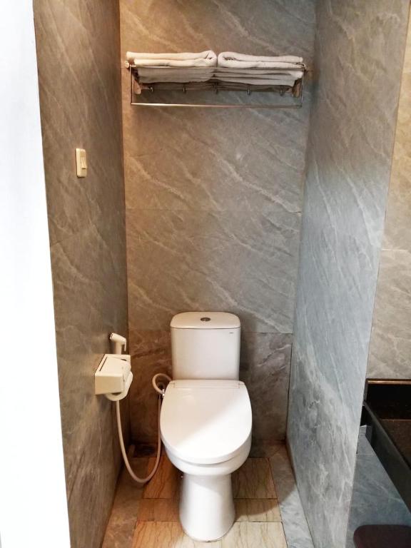 Koupelna v ubytování Grand Cahaya Hotel Pangandaran