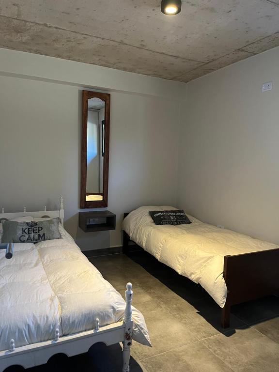 Postel nebo postele na pokoji v ubytování Apapacho casa de Montaña