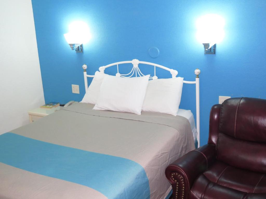 Postel nebo postele na pokoji v ubytování Motel 6-Mitchell, SD