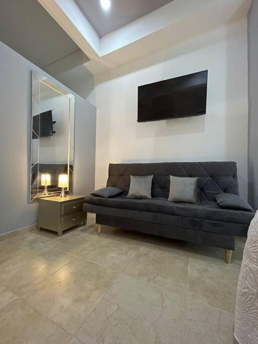 TV a/nebo společenská místnost v ubytování Lindo Apartamento con Jacuzzi en Monteria