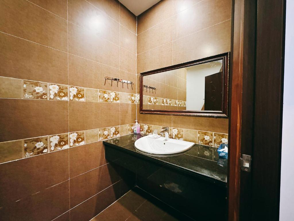 Koupelna v ubytování TTR Joy Apart' Hotel