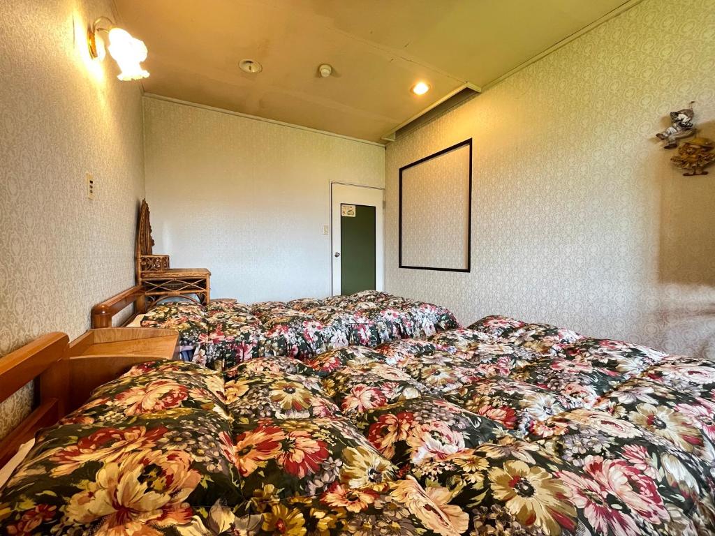 Postel nebo postele na pokoji v ubytování Pension Mon Repos