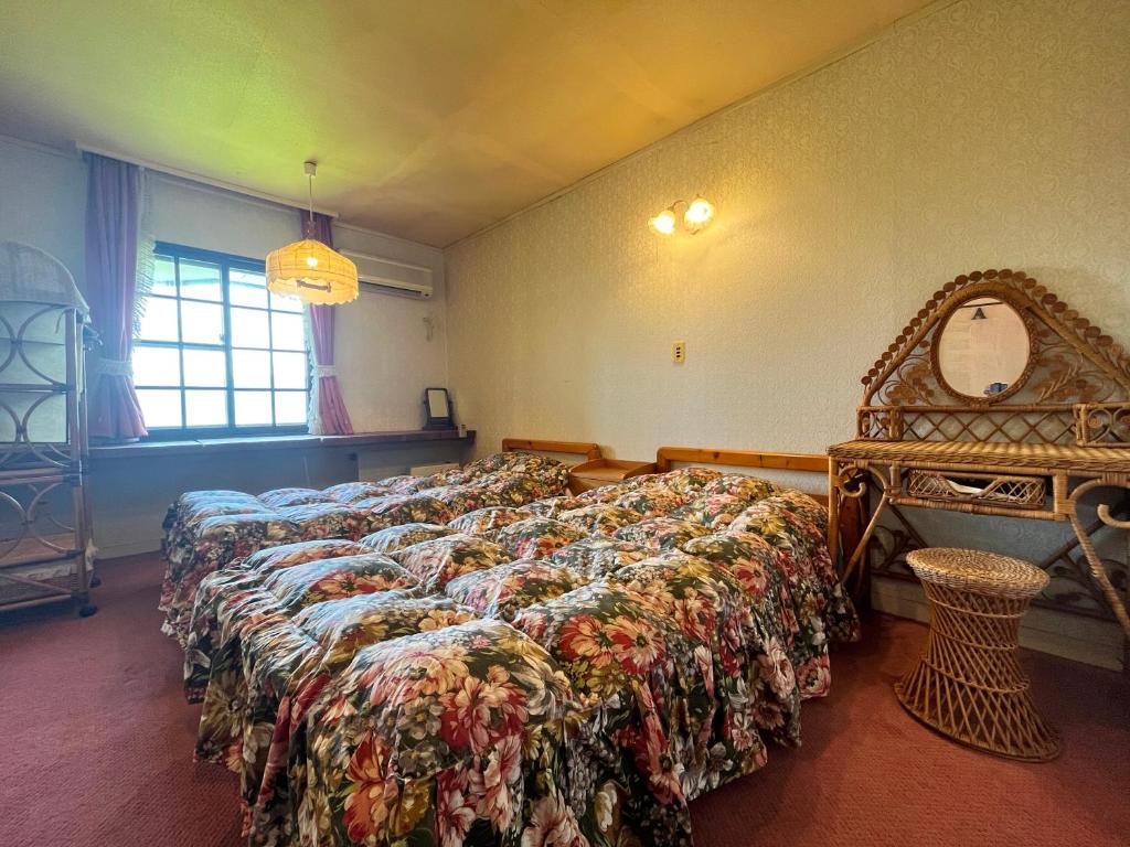 Postel nebo postele na pokoji v ubytování Pension Mon Repos