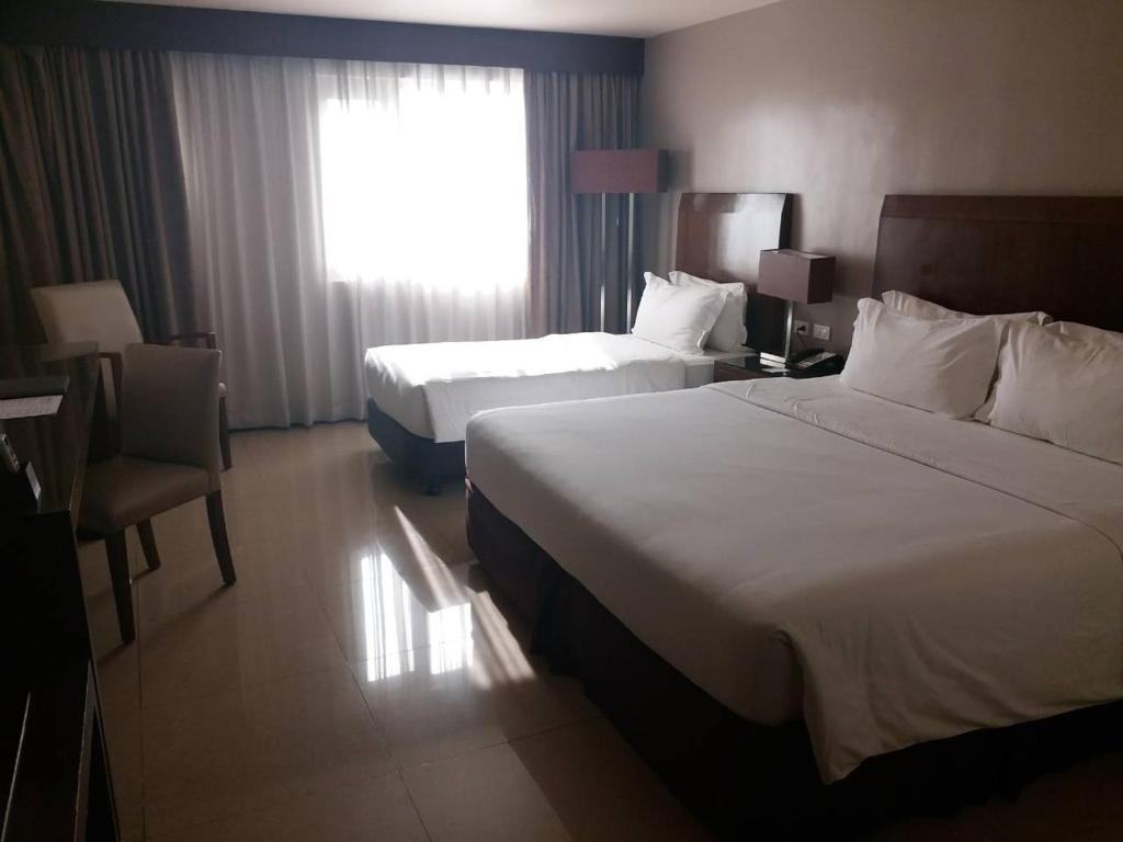 Mandarin Plaza Hotel - 豪华三重房间