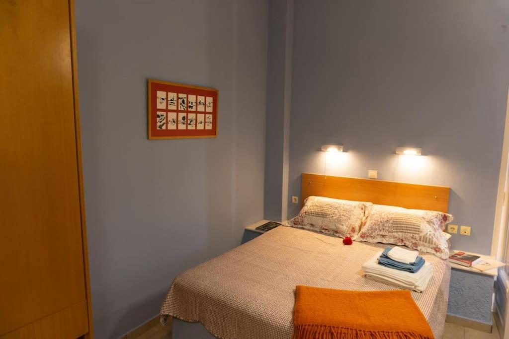 Ένα ή περισσότερα κρεβάτια σε δωμάτιο στο Bright studio near the beach with balcony #3