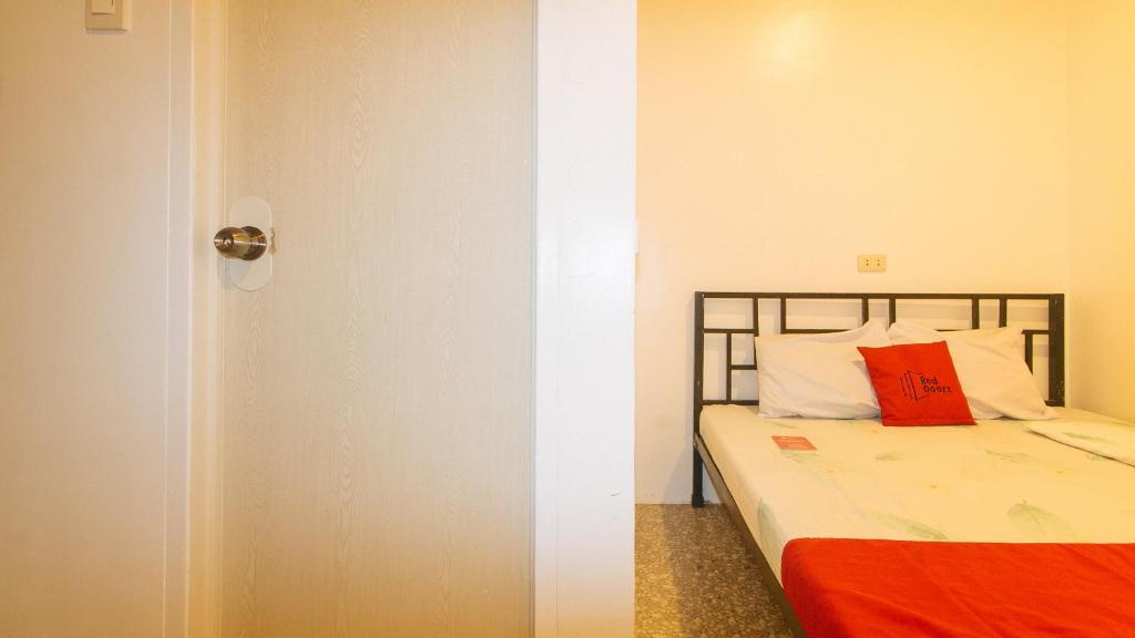 Postel nebo postele na pokoji v ubytování RedDoorz @ Recson Boracay Hostel